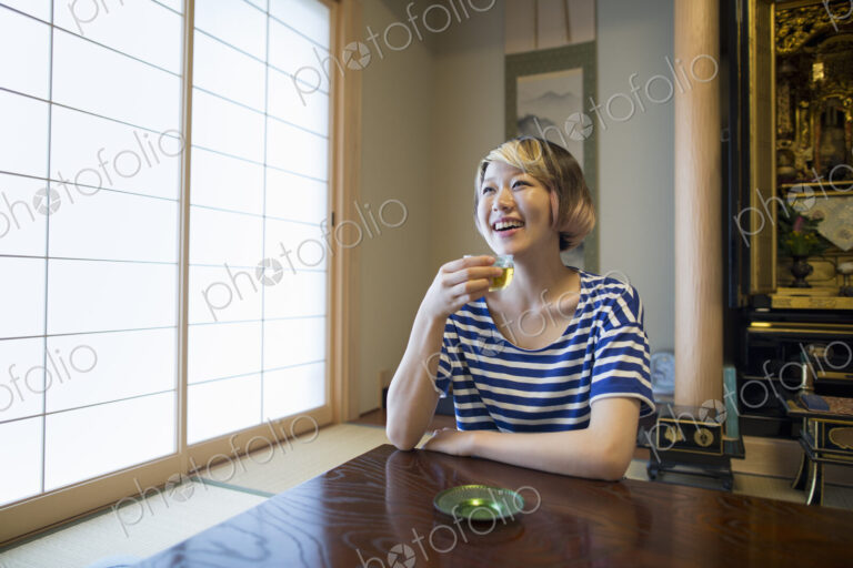 A woman sitting at a table.