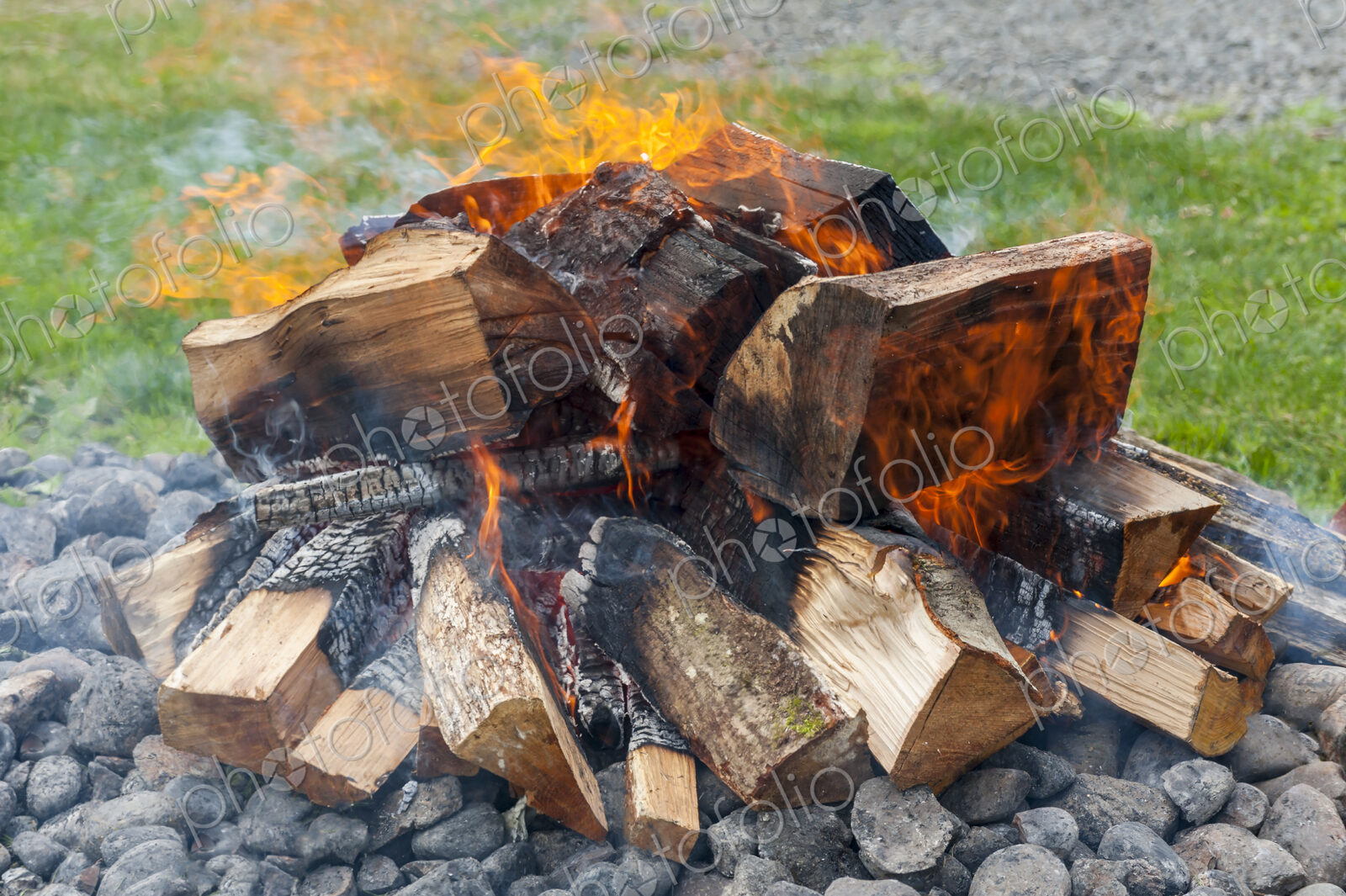 A wood fire with flames.