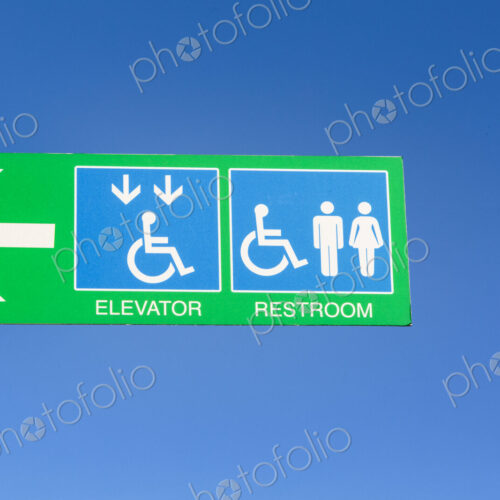ADA Access and regular restrooms sign on a Puget Sound ferry, public restrooms.
