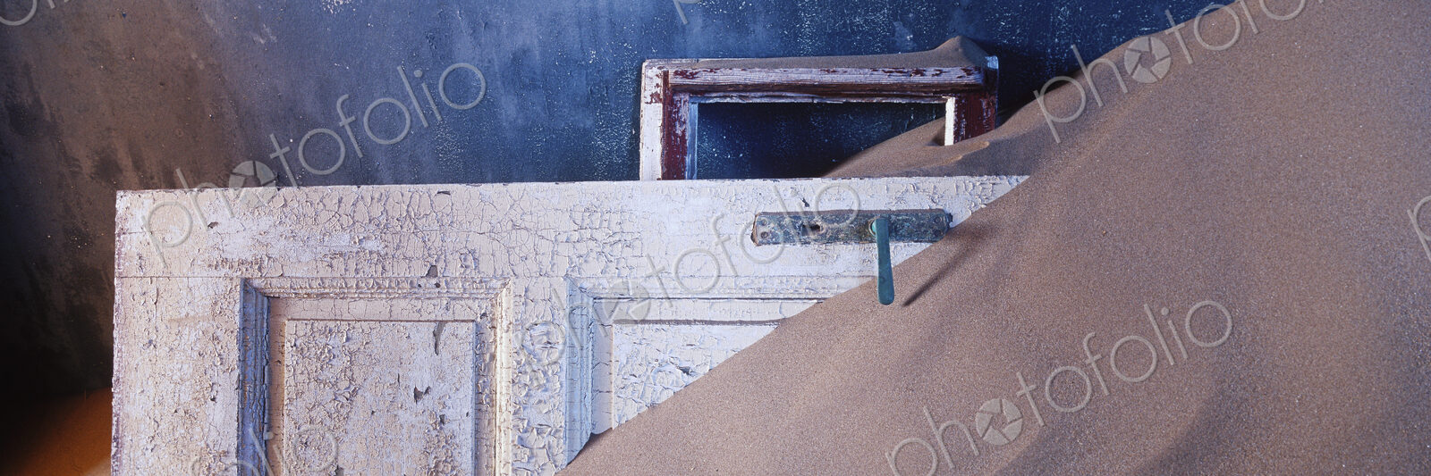 Abandoned House full of drifting sand in a Mining Community of Kolmanskop in the Namib…