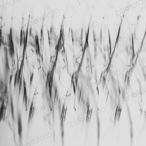 Abstract jagged marks or pattern created by length of fine wire wound around and…