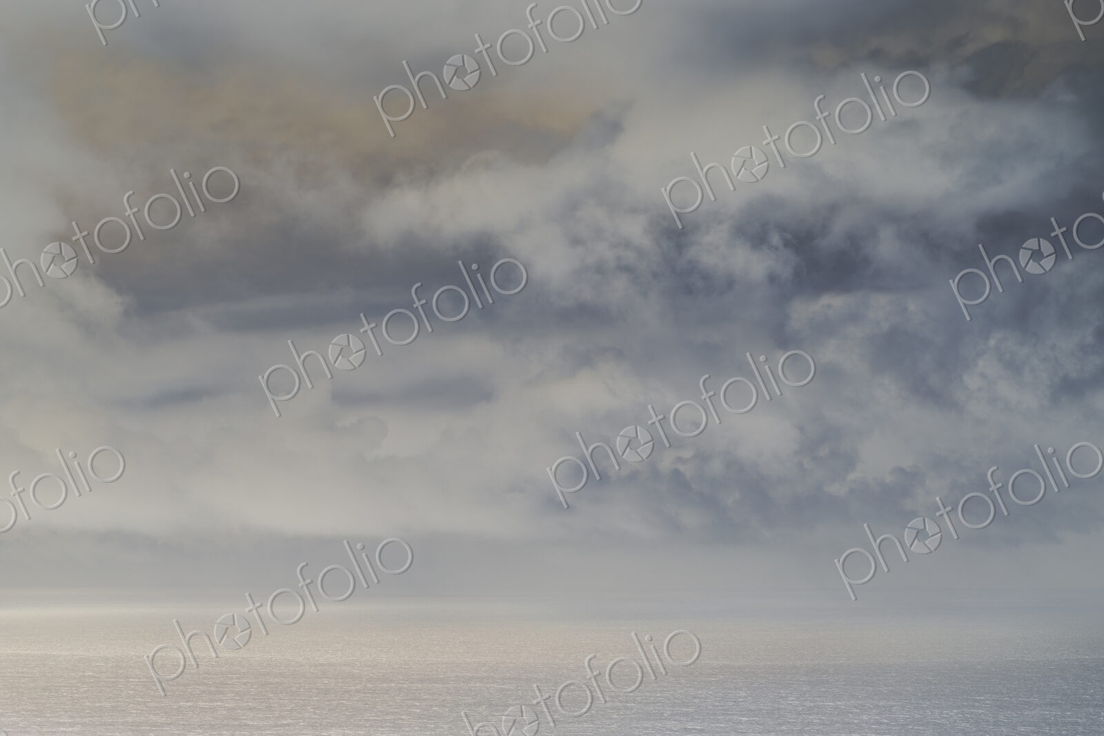 Abstract of clearing storm over vast ocean at dusk, Oregon