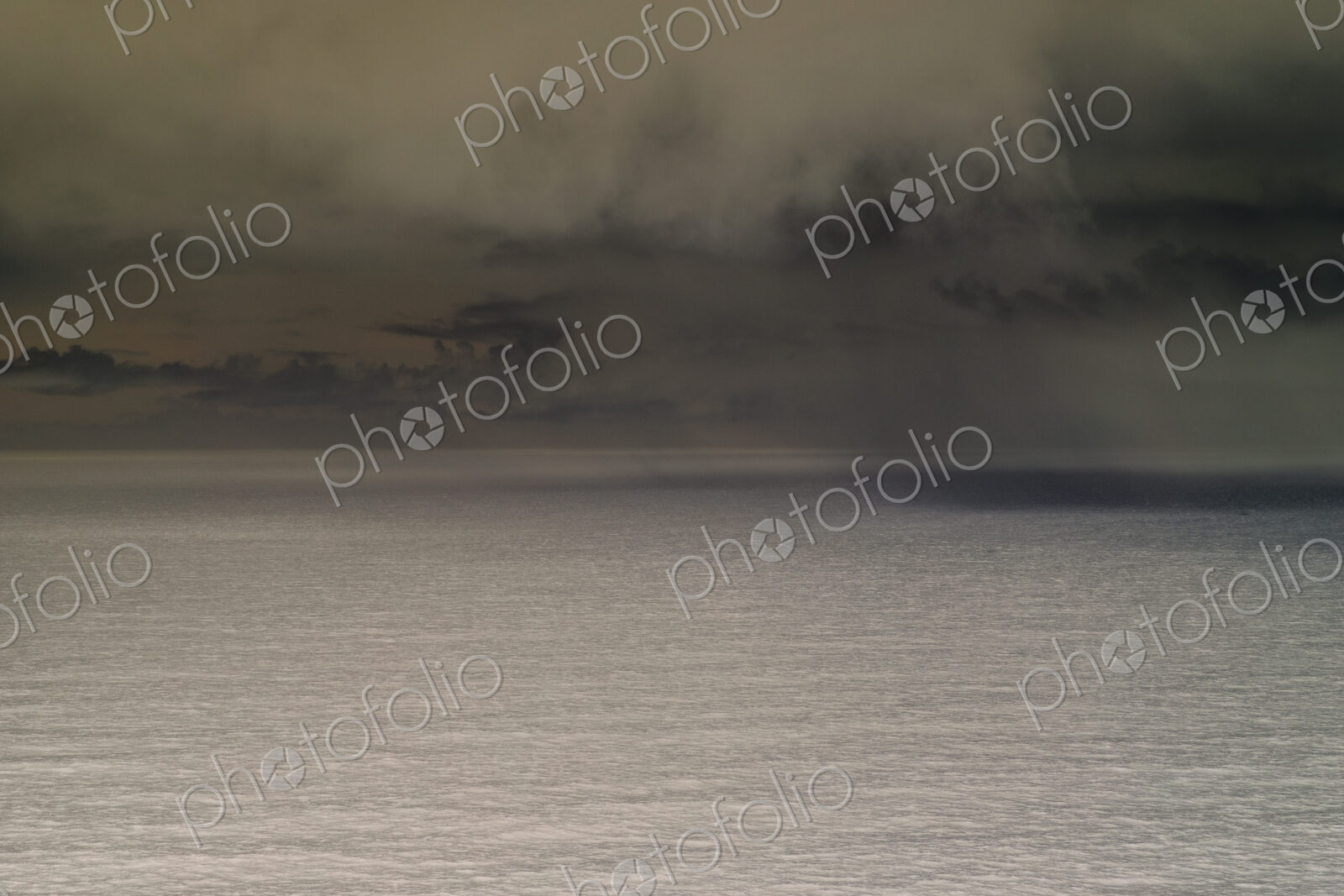 Abstract of clearing storm over vast ocean at dusk, Oregon