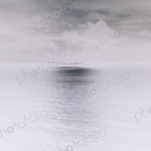 Abstract of clearing storm over vast ocean at dusk, Oregon