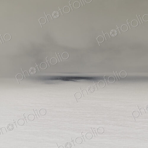Abstract of clearing storm over vast ocean at dusk, Oregon