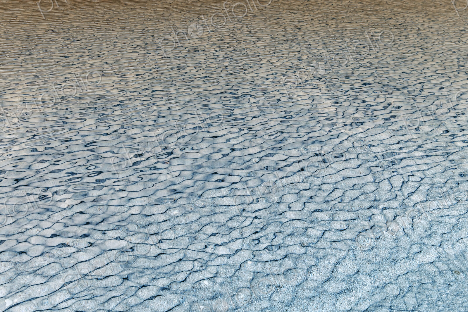 Abstract of lake water reflections and ripples, Lake Tahoe, CA, USA