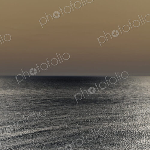 Abstract of vast ocean and sky at dusk Abstract of vast ocean and sky at dusk