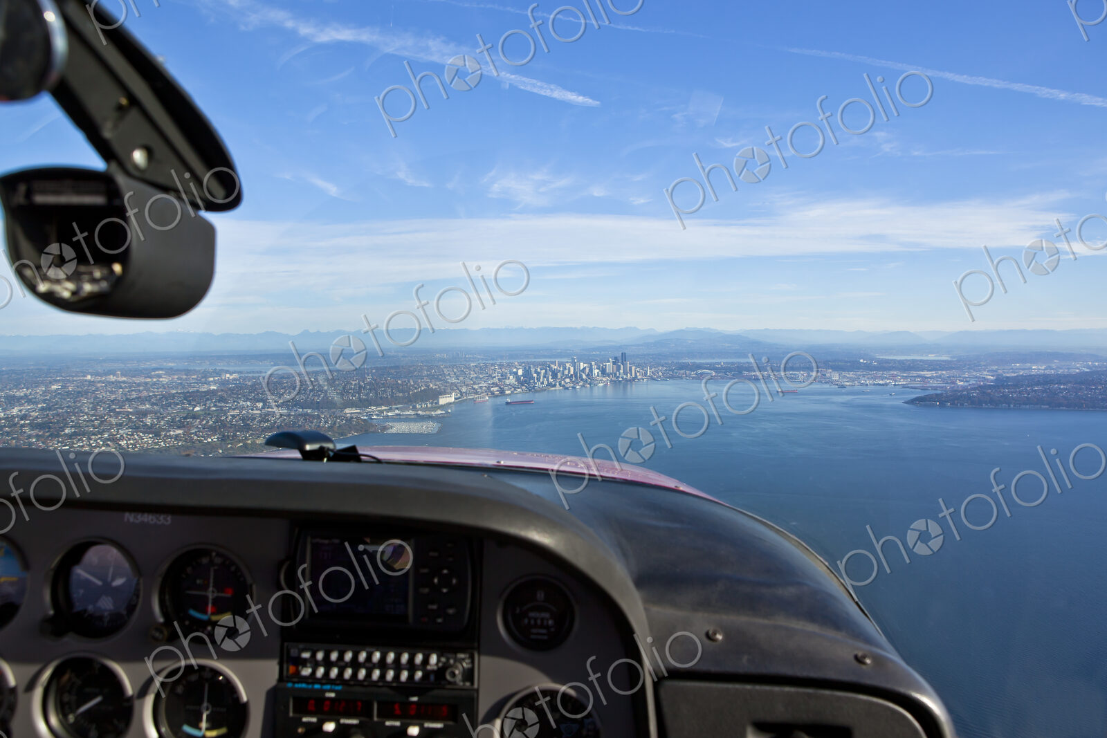 Aerial View Of City On Coast Of Lake