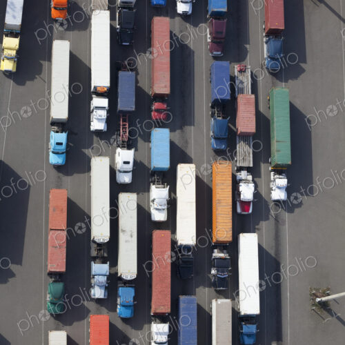 Aerial View of Semi Trucks at a Port Aerial View of Semi Trucks at a Port