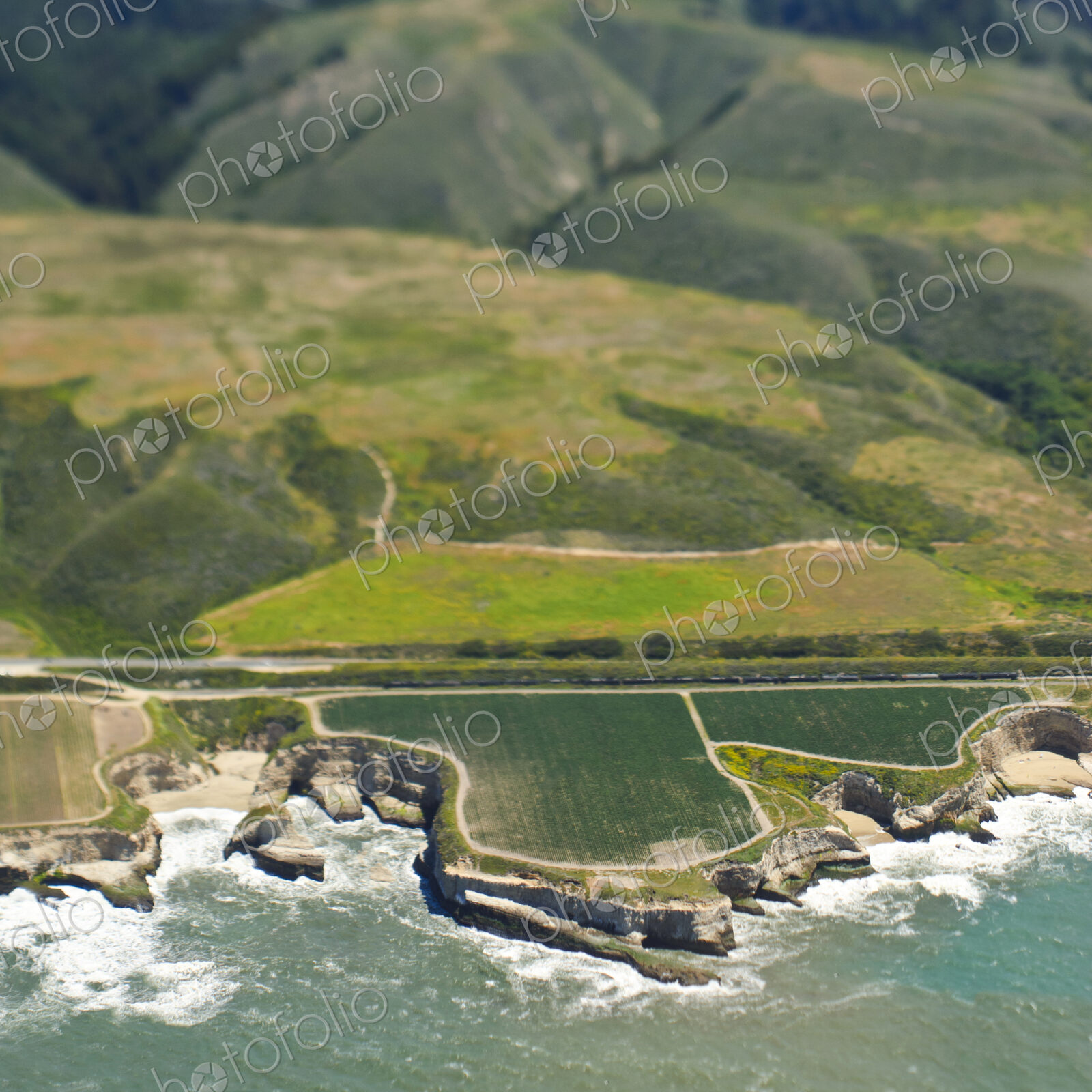 Aerial View of a Coastal Road and Outcrop