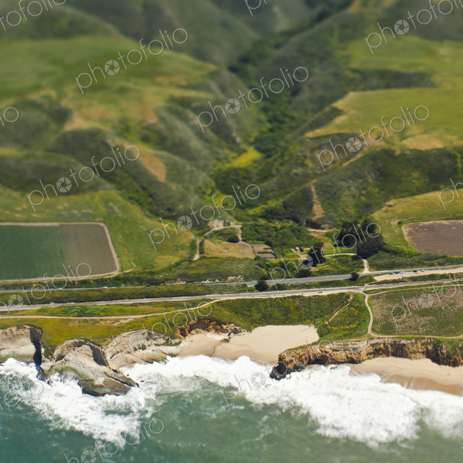 Aerial View of a Coastal Road and Valley
