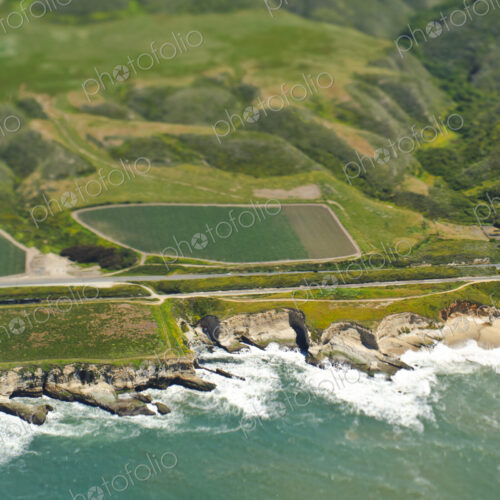 Aerial View of a Coastal Road and Valley Aerial View of a Coastal Road and Valley