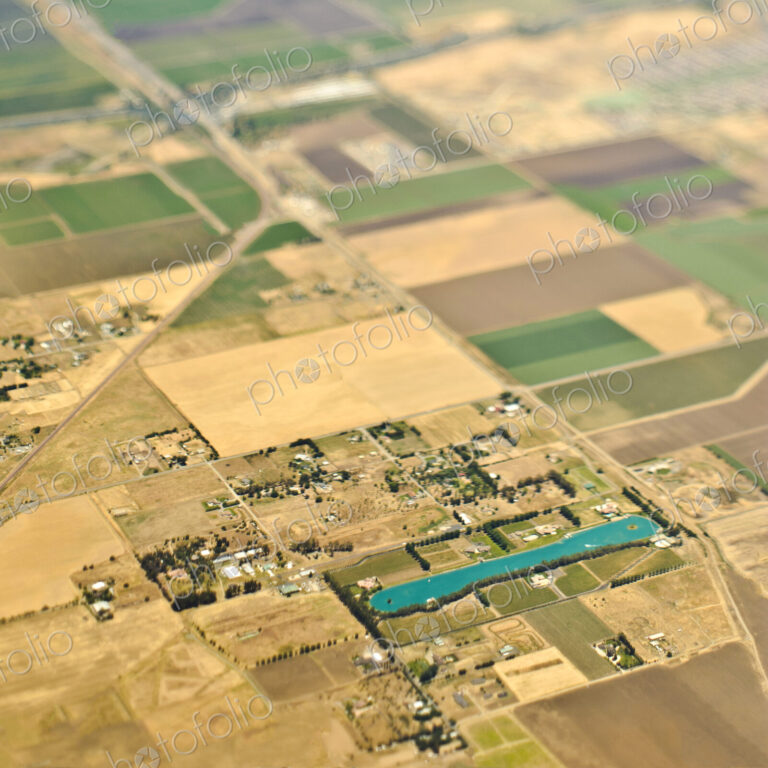 Aerial View of a Lake in an Agricultural Community