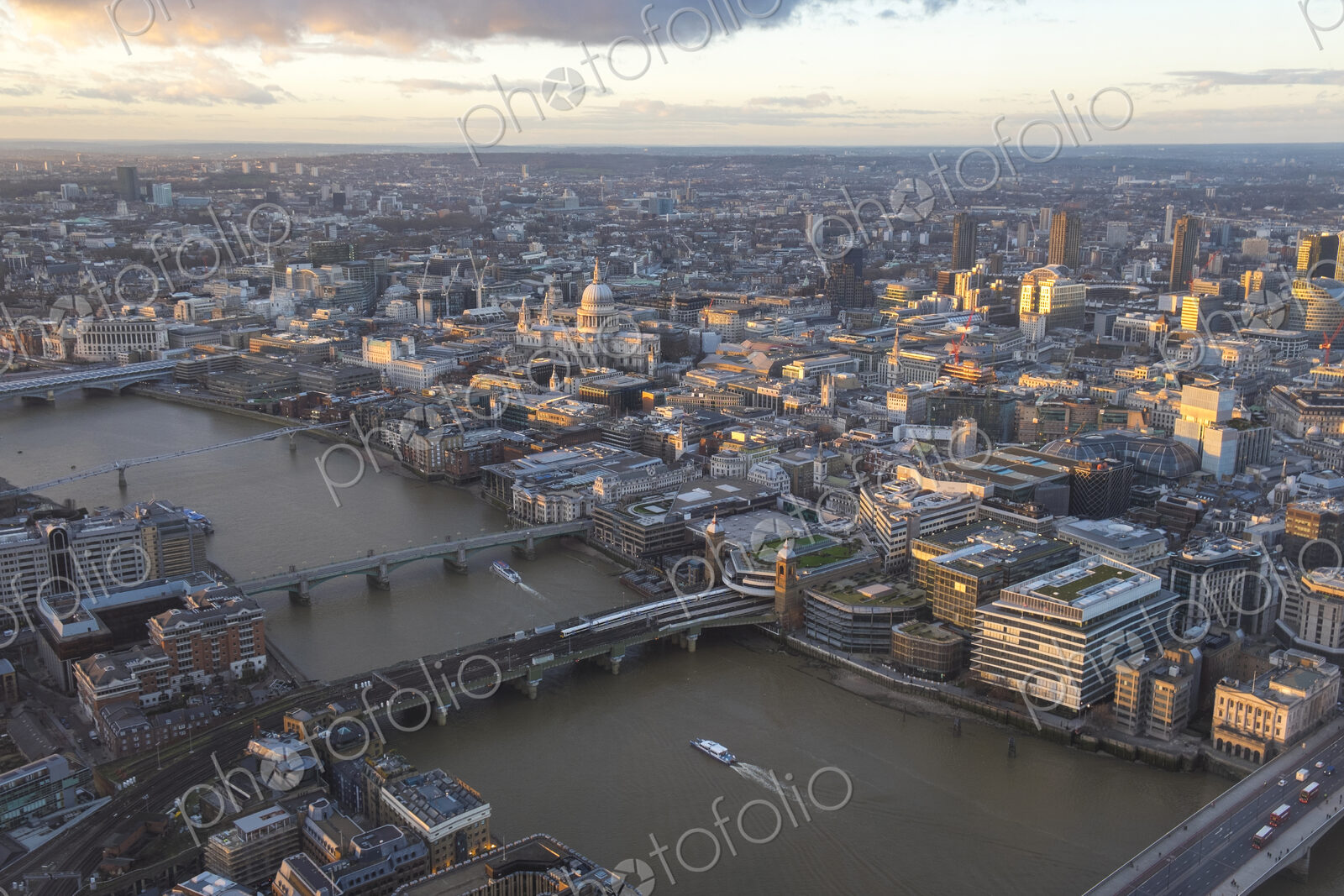 Aerial view of London with bridges crossing river Thames.