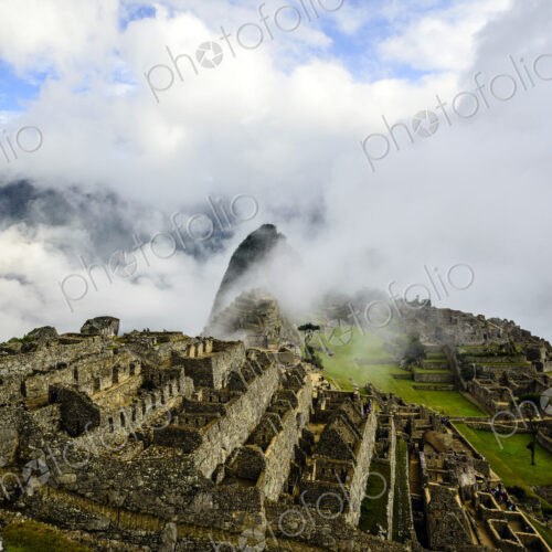 Aerial view of Macchu Picchu ruins in remote landscape, Cusco, Peru