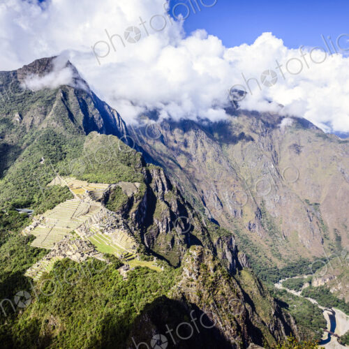 Aerial view of Macchu Picchu ruins in remote landscape, Cusco, Peru