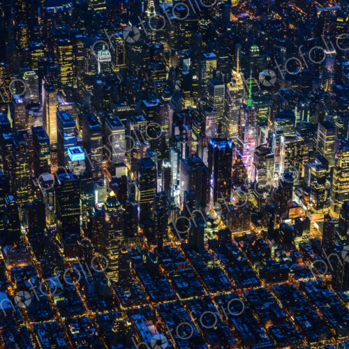 Aerial view of Manhattan cityscape at night, New York, United States Aerial view of Manhattan cityscape at night, New York, United States