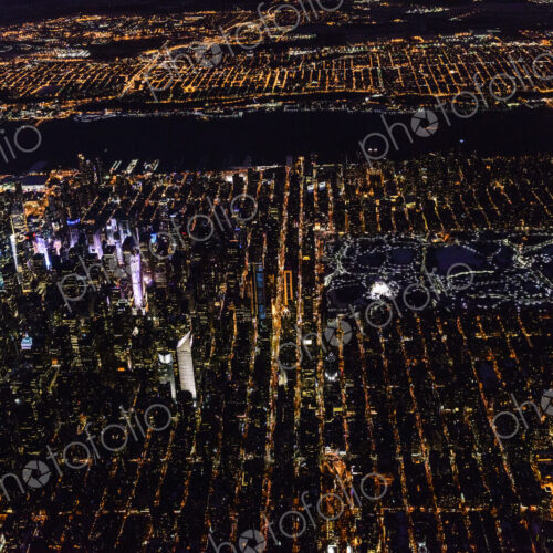 Aerial view of Manhattan cityscape at night, New York, United States Aerial view of Manhattan cityscape at night, New York, United States