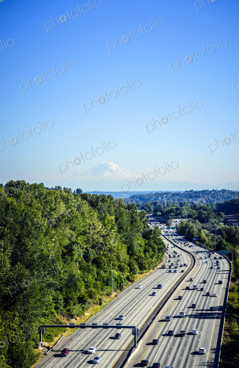 Aerial view of Mount Rainier and freeway, Seattle, Washington, United States
