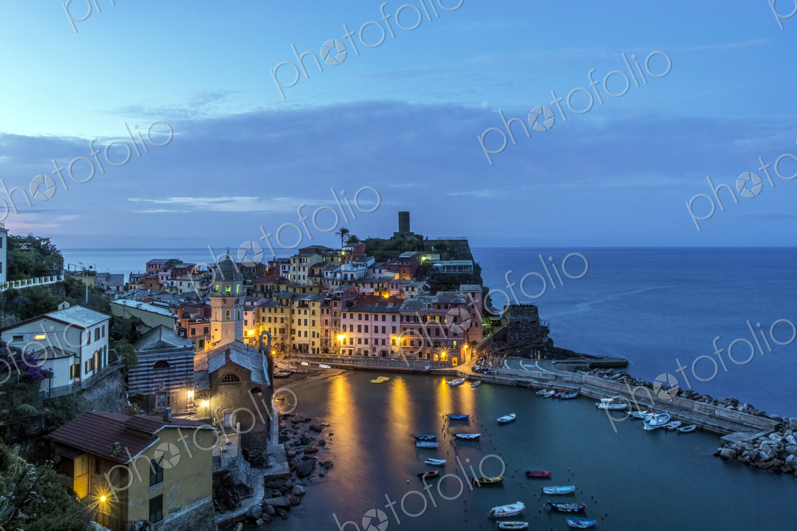 Aerial view of Vernazza cityscape and ocean, La Spezia, Italy