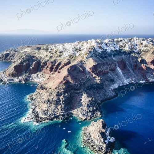Aerial view of an island in the deep blue seas of the Aegean sea, rock formations,… Aerial view of an island in the deep blue seas of the Aegean sea, rock formations,…