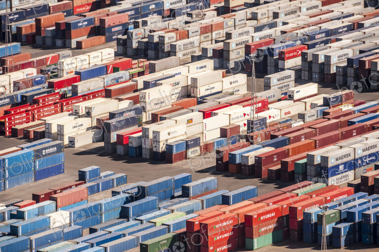 Aerial view of containers in urban shipyard