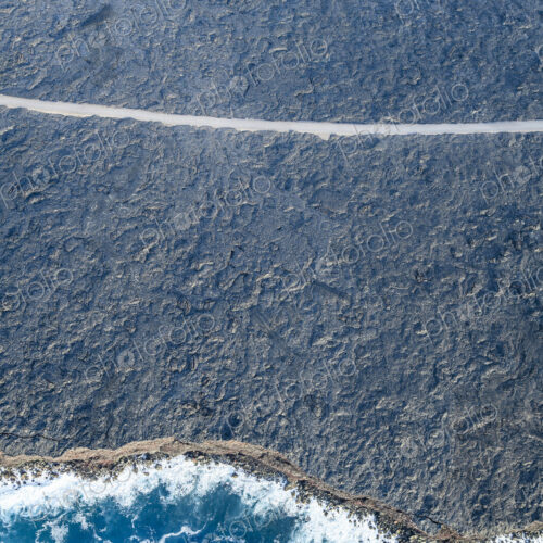 Aerial view of ocean waves on beach, Big Island, Hawaii, United States Aerial view of ocean waves on beach, Big Island, Hawaii, United States