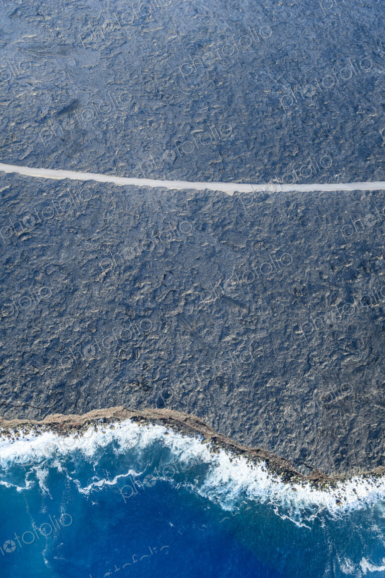 Aerial view of ocean waves on beach, Big Island, Hawaii, United States