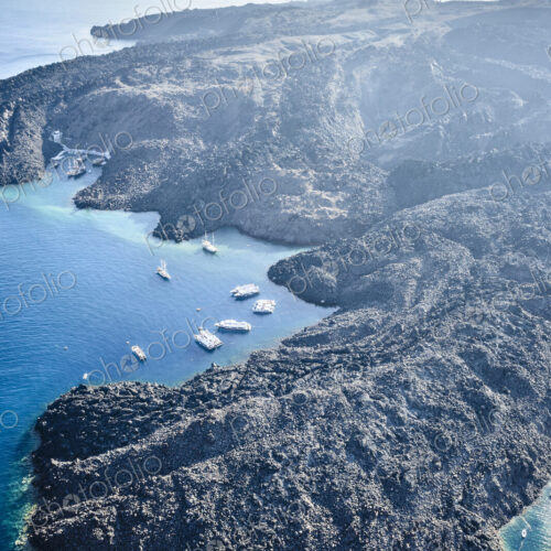 Aerial view of rocky rural coastline, Santorini, Egeo, Greece Aerial view of rocky rural coastline, Santorini, Egeo, Greece