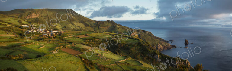 Aerial view of rural fields in coastal landscape