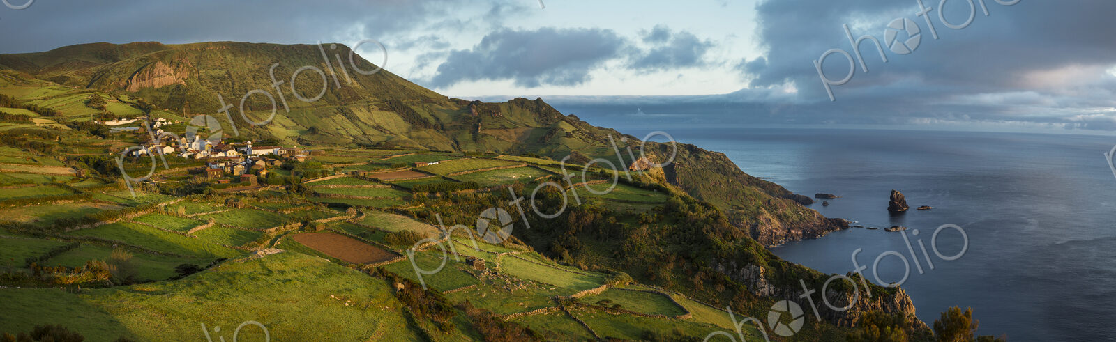 Aerial view of rural fields in coastal landscape