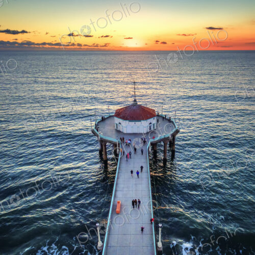 Aerial view of the Manhattan Beach Pier at sunset. Aerial view of the Manhattan Beach Pier at sunset.