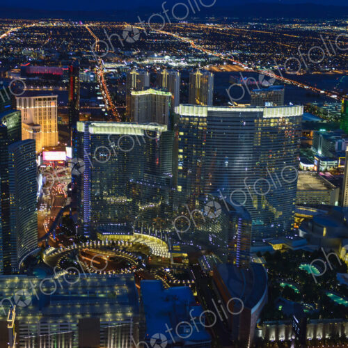Aerial view of the city of Las Vegas at dusk, city lights and tall buildings of the…