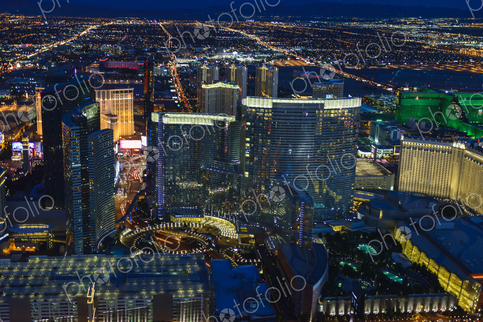 Aerial view of the city of Las Vegas at dusk, city lights and tall buildings of the…