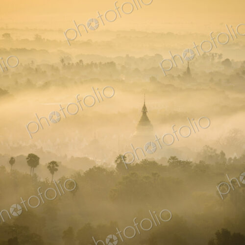 Aerial view of towers in misty landscape Aerial view of towers in misty landscape