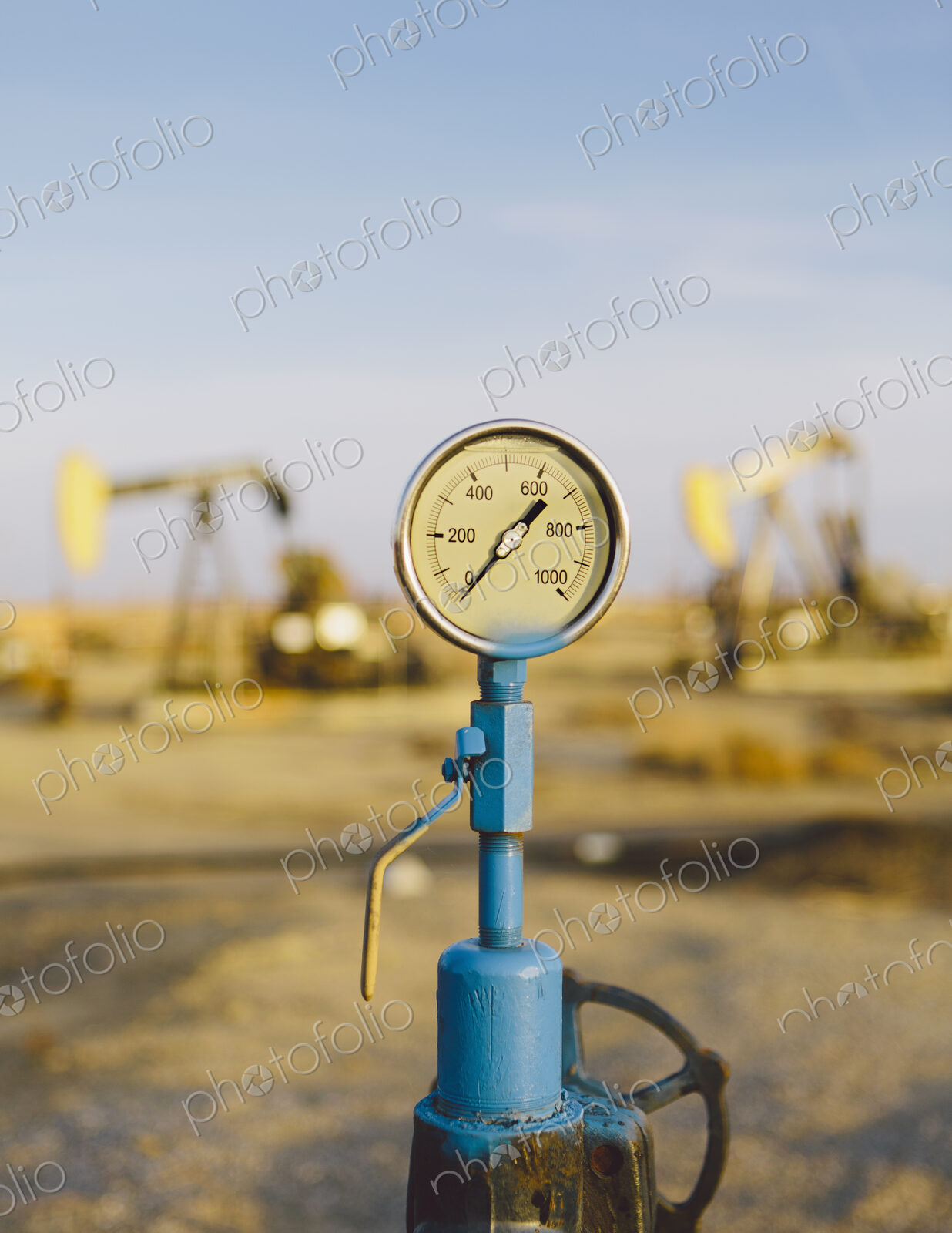 Air pressure gauge, oil rigs in background, Sunset-Midway oil fields, the largest in…