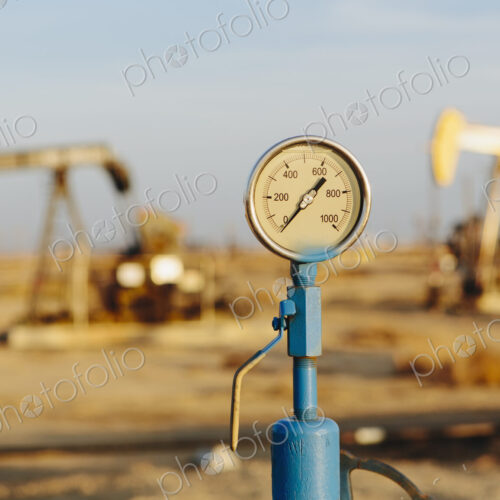 Air pressure gauge, oil rigs in background, Sunset-Midway oil fields, the largest in…