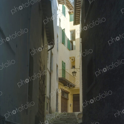 Alleyway in Historic District in Spoleto, Umbria, Italy. Alleyway in Historic District in Spoleto, Umbria, Italy.