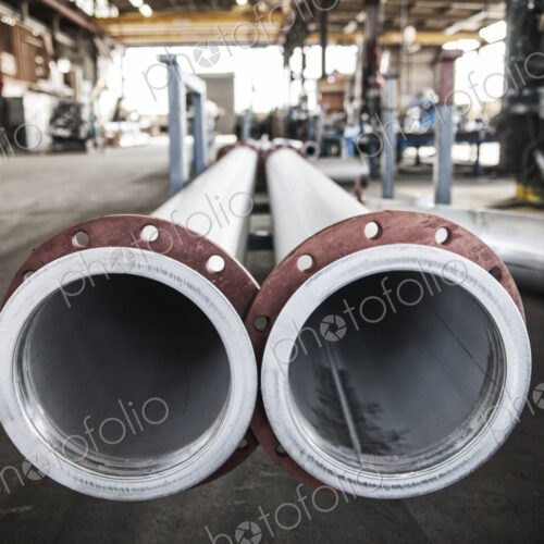 Aluminum pipes manufactured in a sheet metal factory.