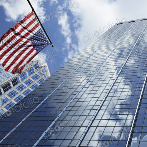 American Flag Against Office Buildings American Flag Against Office Buildings