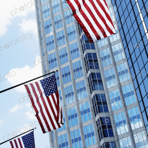 American Flags Against Office Buildings American Flags Against Office Buildings