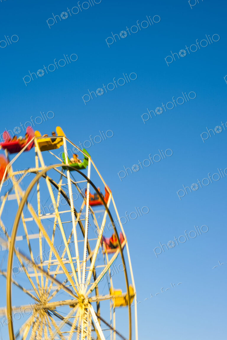 Amusement Park, Santa Cruz, a large ferris wheel,, low angle view, blue sky background.