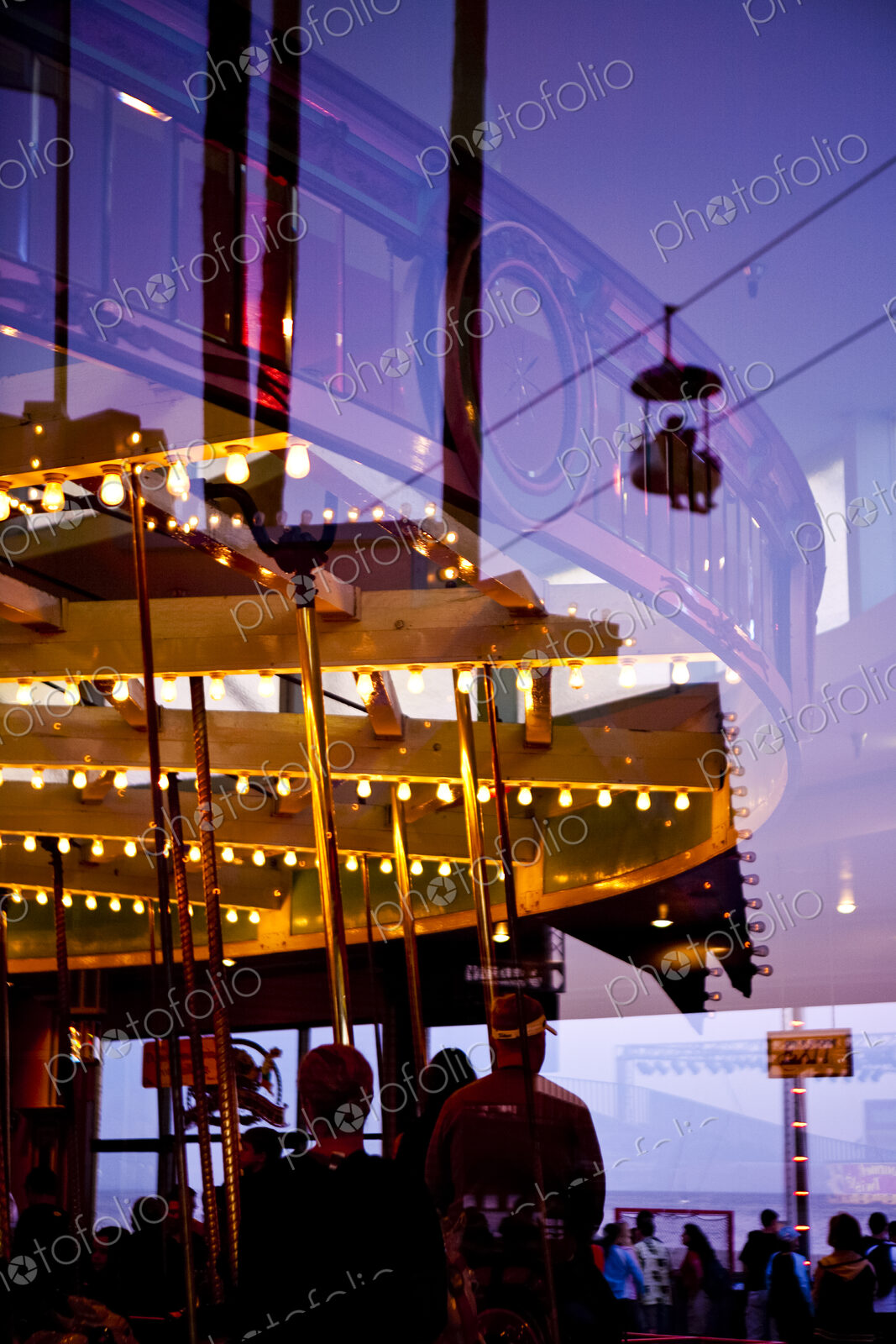 Amusement Park, Santa Cruz, reflection of a roundabout ride in a funfair at dusk,…