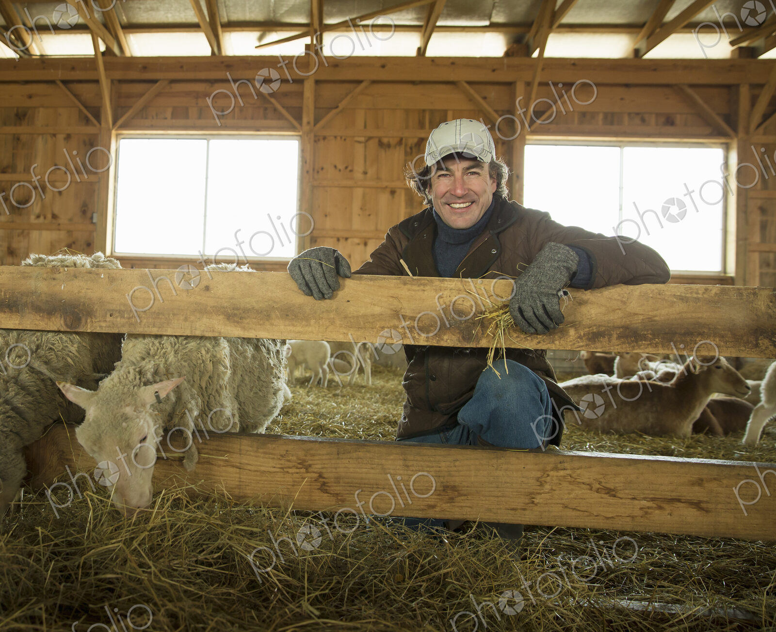 An Organic Farm in Winter in Cold Spring, New York State. A family working caring for…