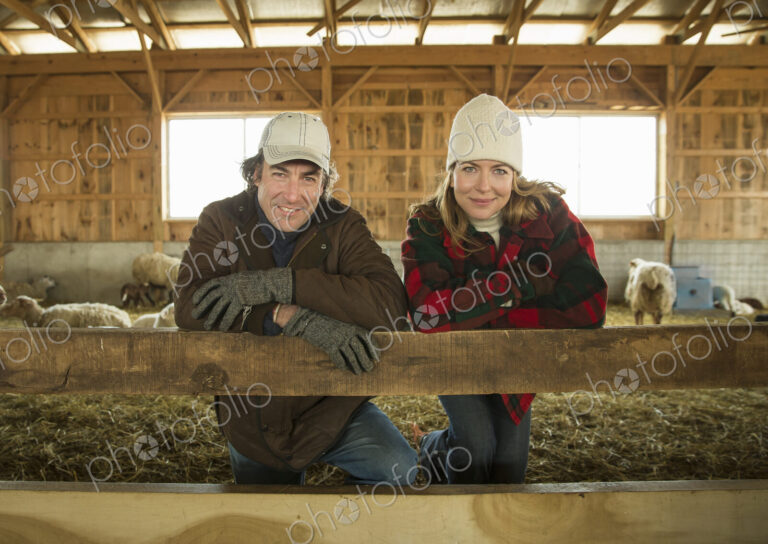 An Organic Farm in Winter in Cold Spring, New York State. A farmer and a woman…