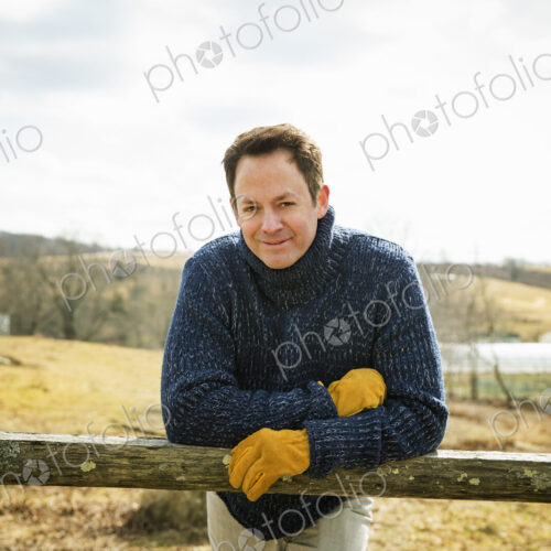 An Organic Farm in Winter in Cold Spring, New York State. A man working outdoors on… An Organic Farm in Winter in Cold Spring, New York State. A man working outdoors on…