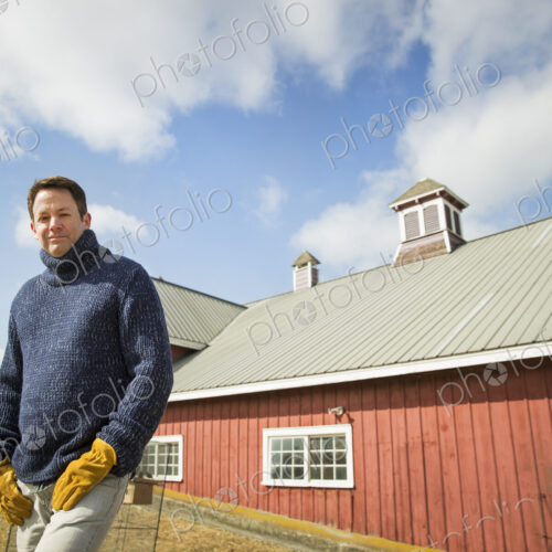 An Organic Farm in Winter in Cold Spring, New York State. A man working outdoors on… An Organic Farm in Winter in Cold Spring, New York State. A man working outdoors on…