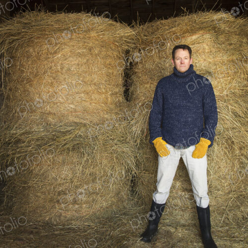 An Organic Farm in Winter in Cold Spring, New York State. A man working outdoors on… An Organic Farm in Winter in Cold Spring, New York State. A man working outdoors on…