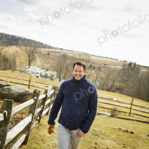An Organic Farm in Winter in Cold Spring, New York State. A man working outdoors on… An Organic Farm in Winter in Cold Spring, New York State. A man working outdoors on…