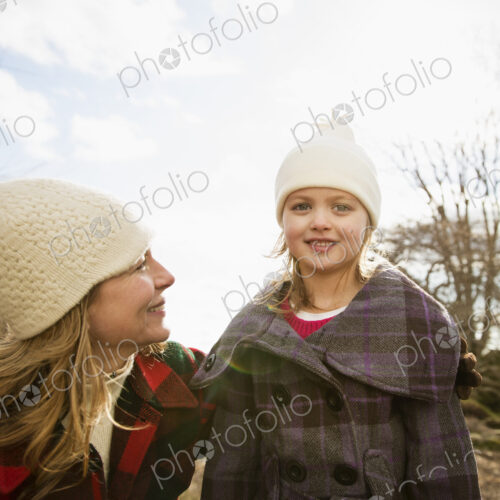 An Organic Farm in Winter in Cold Spring, New York State. A woman and child wrapped up… An Organic Farm in Winter in Cold Spring, New York State. A woman and child wrapped up…